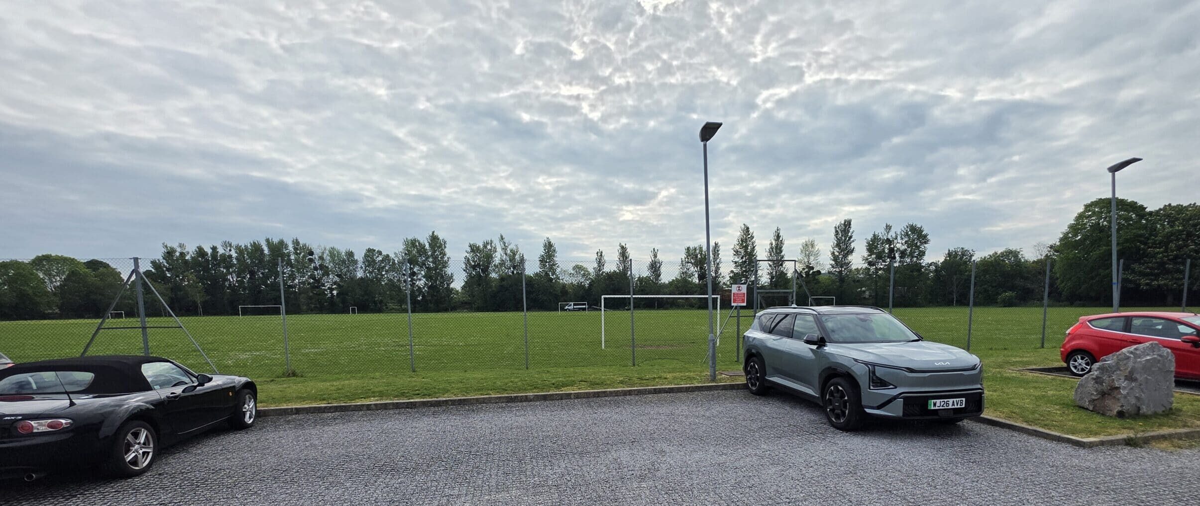 Outdoor football fields next to the Blackbrook Leisure Centre car park where Mini Footy outdoor sessions take place in Taunton.